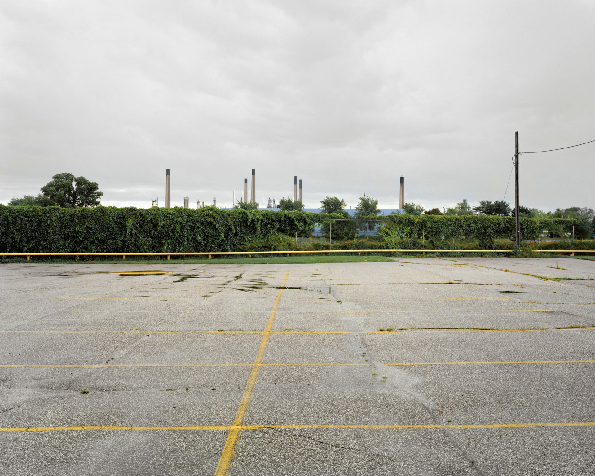 Parking-lot-Imperial-Oil-Complex-in-the-Background